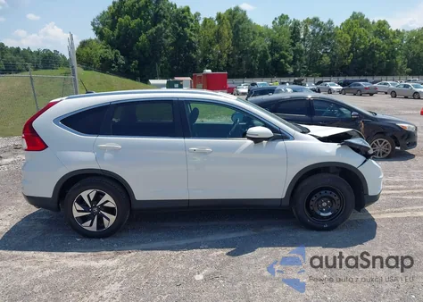 2016 Honda Cr-V Touring z USA, uszkodzony, nr VIN 5J6RM4H95GL118070